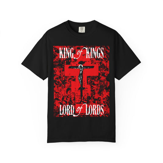 Black heavyweight cotton unisex tee featuring a red cross with nature texture, white "King of Kings, Lord of Lords" text, Christ crucified iconographic design. Inspired by the Word of God.