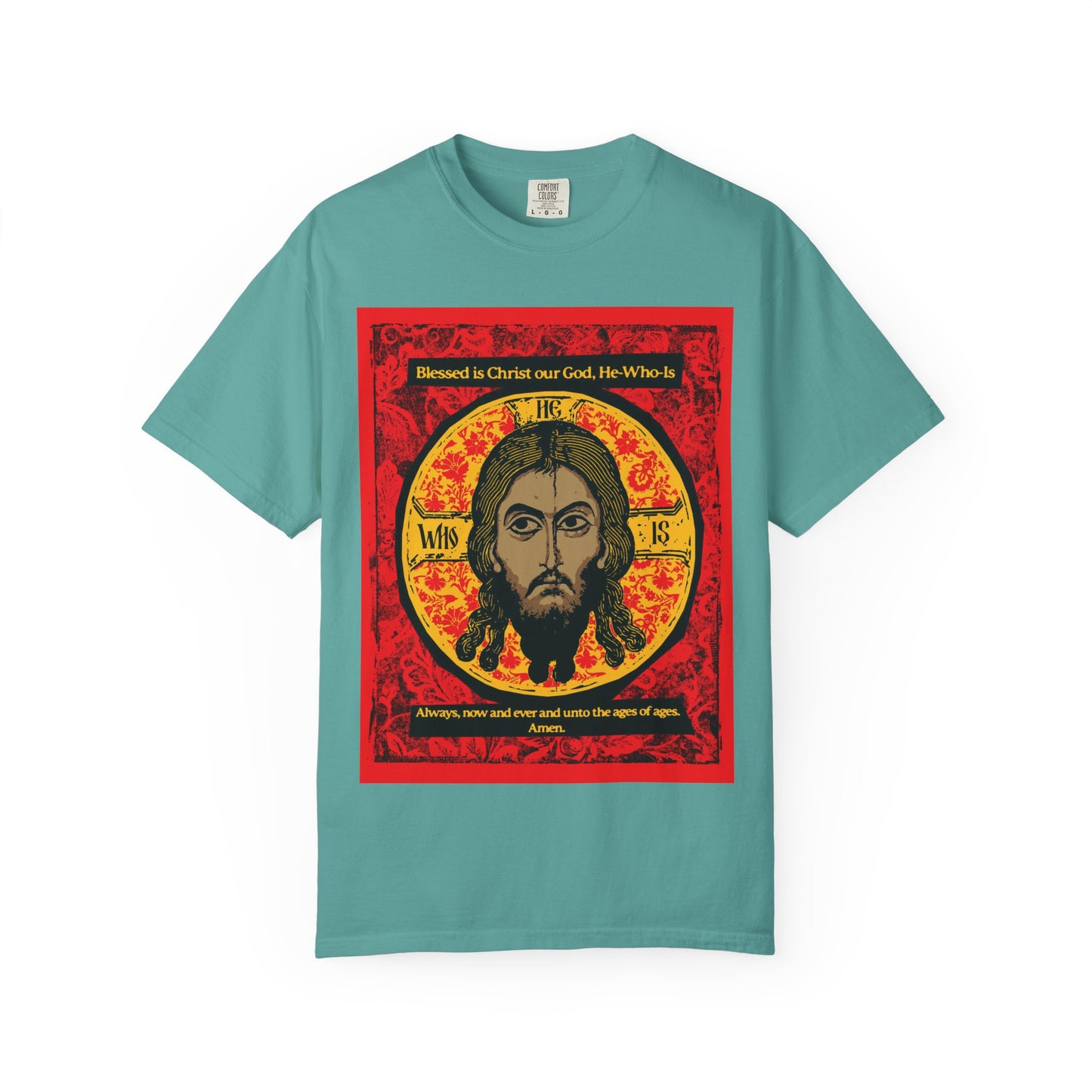 Seafoam "Made Without Hands" T-shirt featuring a red and yellow icon of Christ’s face, Orthodox hymn Troparion Tone 2 reference, and religious text above and below. Heavyweight cotton, unisex design.