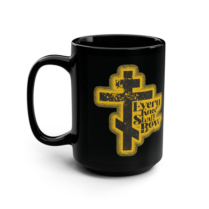 Black mug featuring a 70s distressed halftone comic book design with "Every Knee Shall Bow," inspired by Philippians 2:10-11 and Isaiah 45:23. Orthodox Christian theme declares Jesus is Lord.