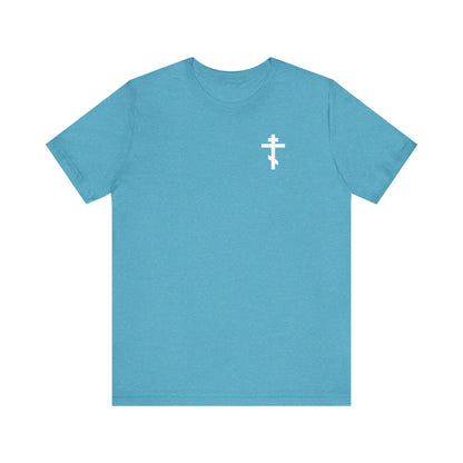 Heather aqua tee with a white cross on the front left breast and skull and crossBACK design; red rose accent. Lightweight cotton, unisex, goth aesthetic.