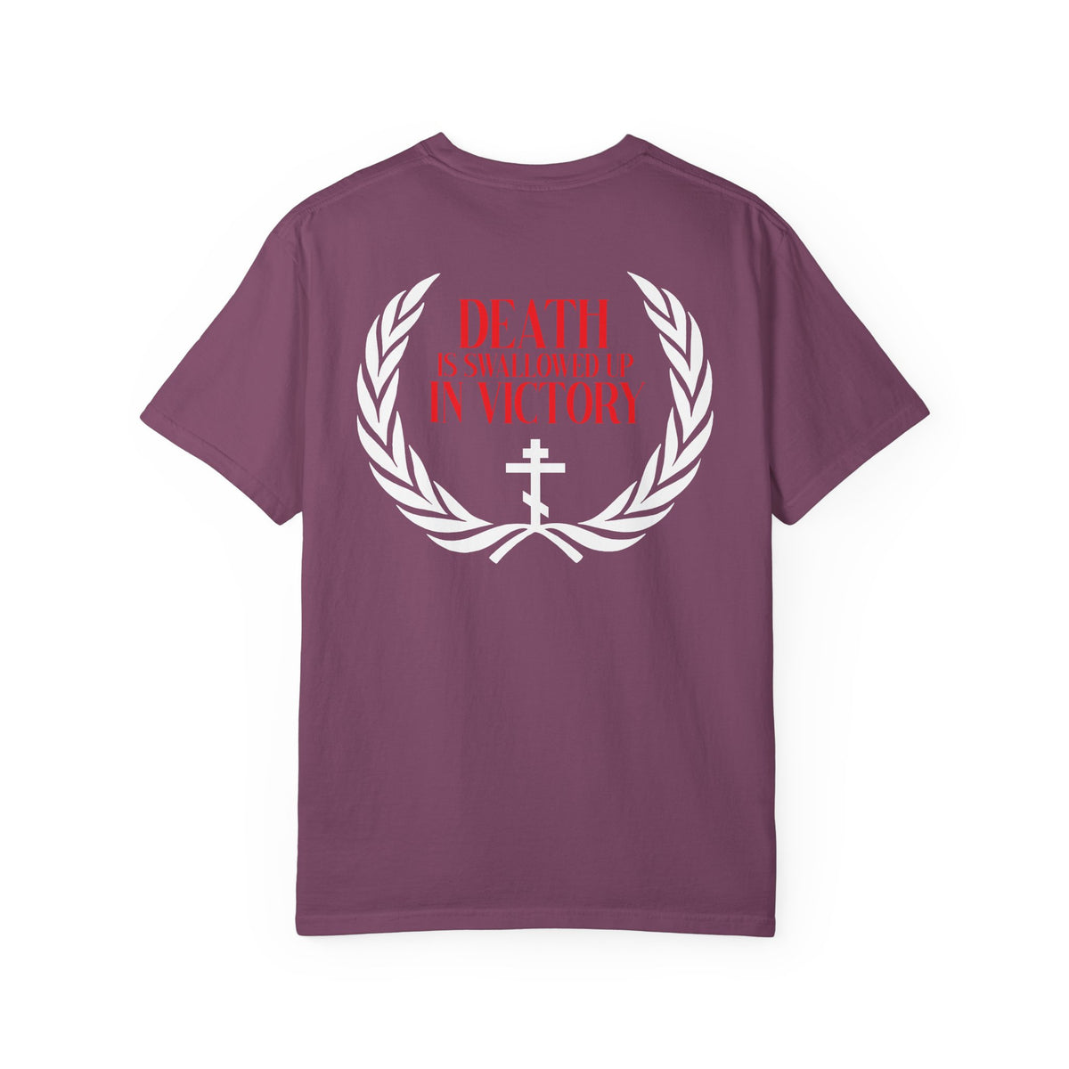 Here’s a revised sentence using your product data: The Archangel Michael of the Apocalypse Iconographic / Death is Swallowed Up In Victory DOUBLE-SIDED Heavyweight Cotton Orthodox Unisex Tee features a purple base with a white laurel, bold red “DEATH IS SWALLOWED UP IN VICTORY” text, and a white cross—drawing inspiration from Revelation 12 and the Miracle of Archangel Michael.