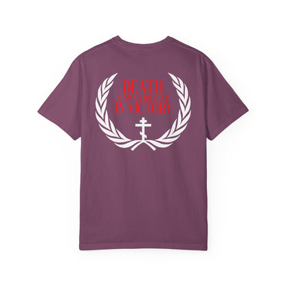 Here’s a revised sentence using your product data: The Archangel Michael of the Apocalypse Iconographic / Death is Swallowed Up In Victory DOUBLE-SIDED Heavyweight Cotton Orthodox Unisex Tee features a purple base with a white laurel, bold red “DEATH IS SWALLOWED UP IN VICTORY” text, and a white cross—drawing inspiration from Revelation 12 and the Miracle of Archangel Michael.