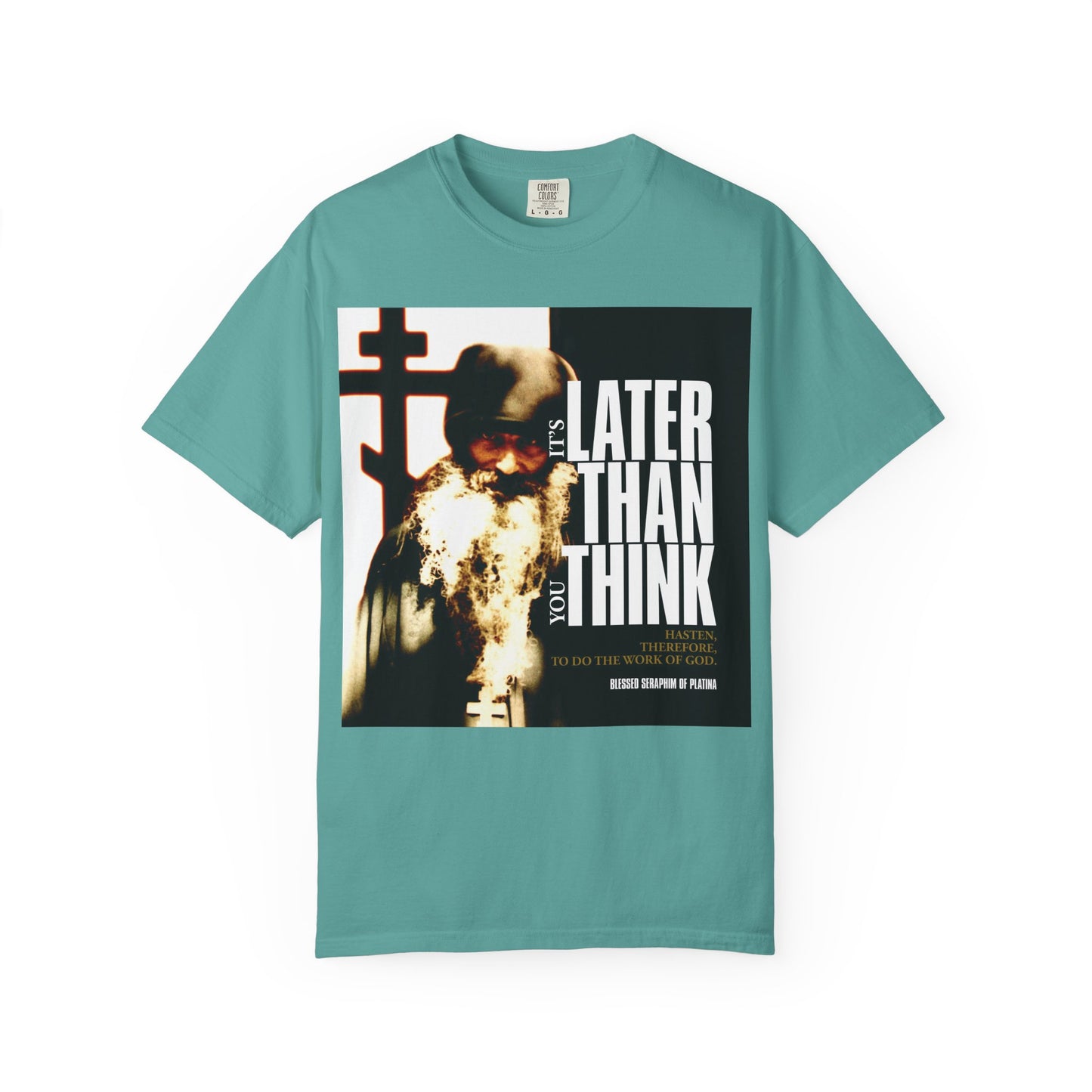 Seafoam heavyweight cotton unisex T-shirt featuring Fr Seraphim Rose with modern cinematic poster typography and the phrase "It's Later Than You Think"—a subtle call to reflect on your life.