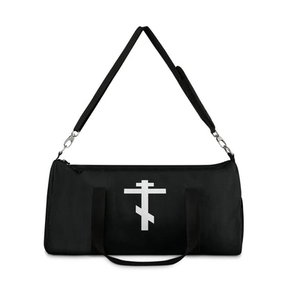 Orthodox Christian gym duffel bag featuring a white Orthodox cross inspired by St. John of Kronstadt, Gal 6:14 ("May I never boast, except in the cross of our Lord Jesus Christ"), and an adjustable shoulder strap.