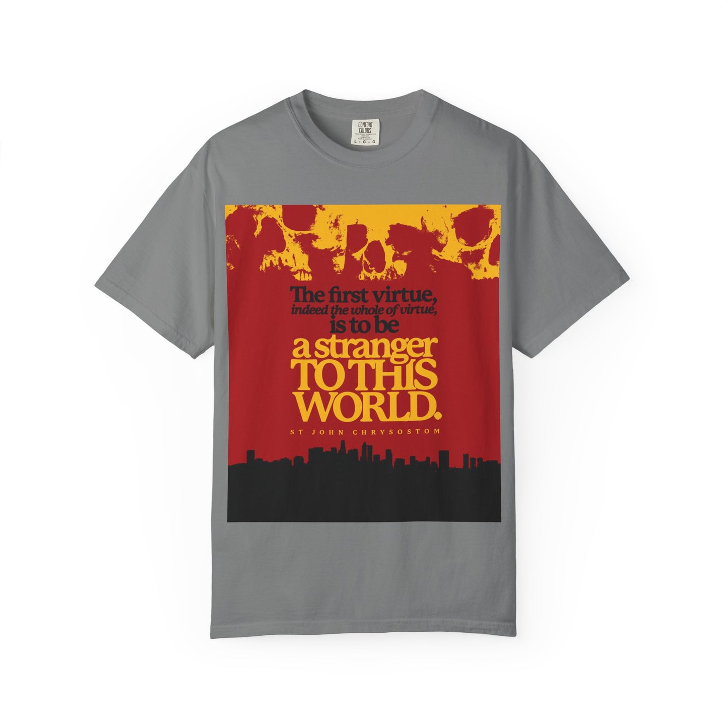 Grey heavyweight unisex t-shirt featuring a skulls and cityscape graphic with a St John Chrysostom quote—"All of Virtue is Be a Stranger To this World"—inspired by Hebrews 11:13-16. Orthodox Christian design.