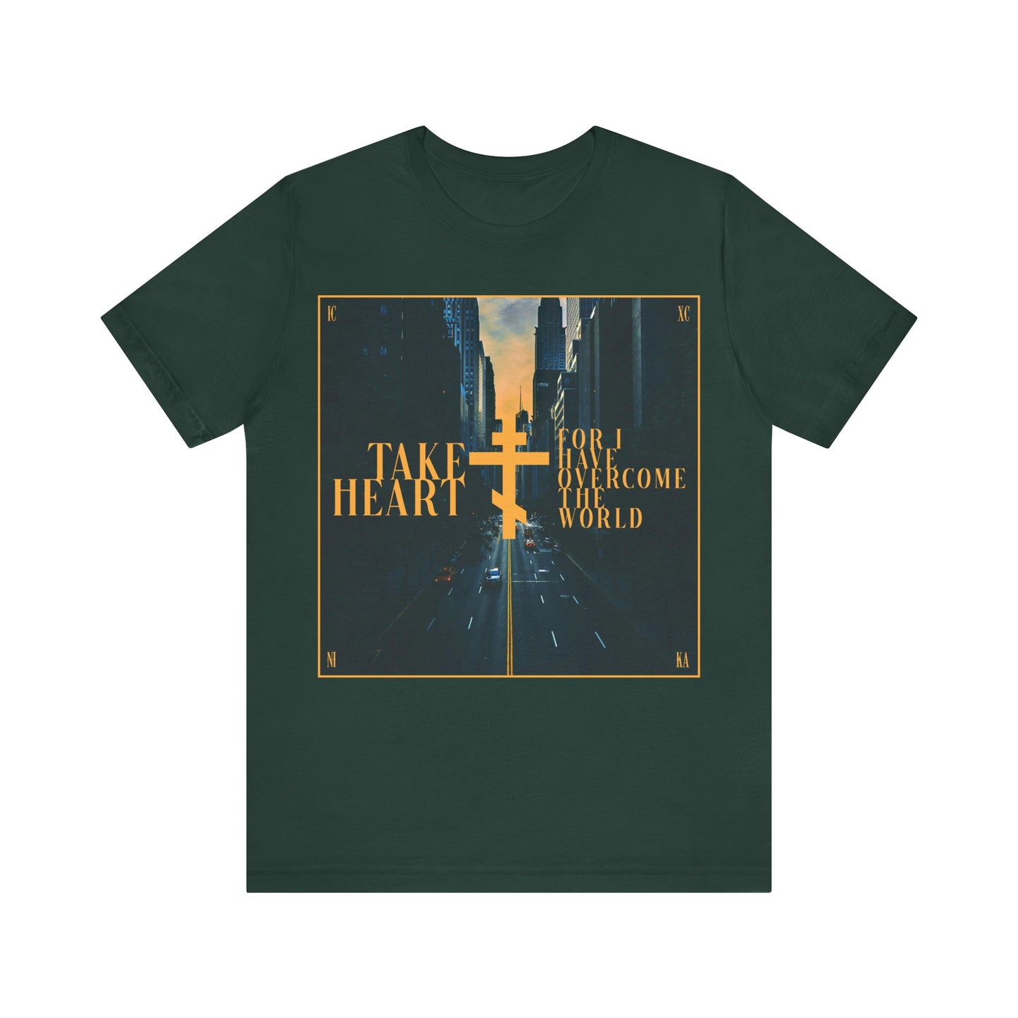 Forest t-shirt featuring a modern city street scene and gold "Take heart, for I have overcome the world" (John 16:33) text—a daily reminder from Orthodox Christian faith to rejoice as sorrow turns to joy.