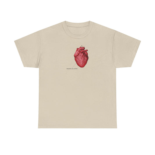 Sand-colored heavy cotton t-shirt featuring a red retro medical textbook heart, Orthodox cross, "Remember You Will Die," and memento mori text inspired by Christian themes of mercy and repentance.