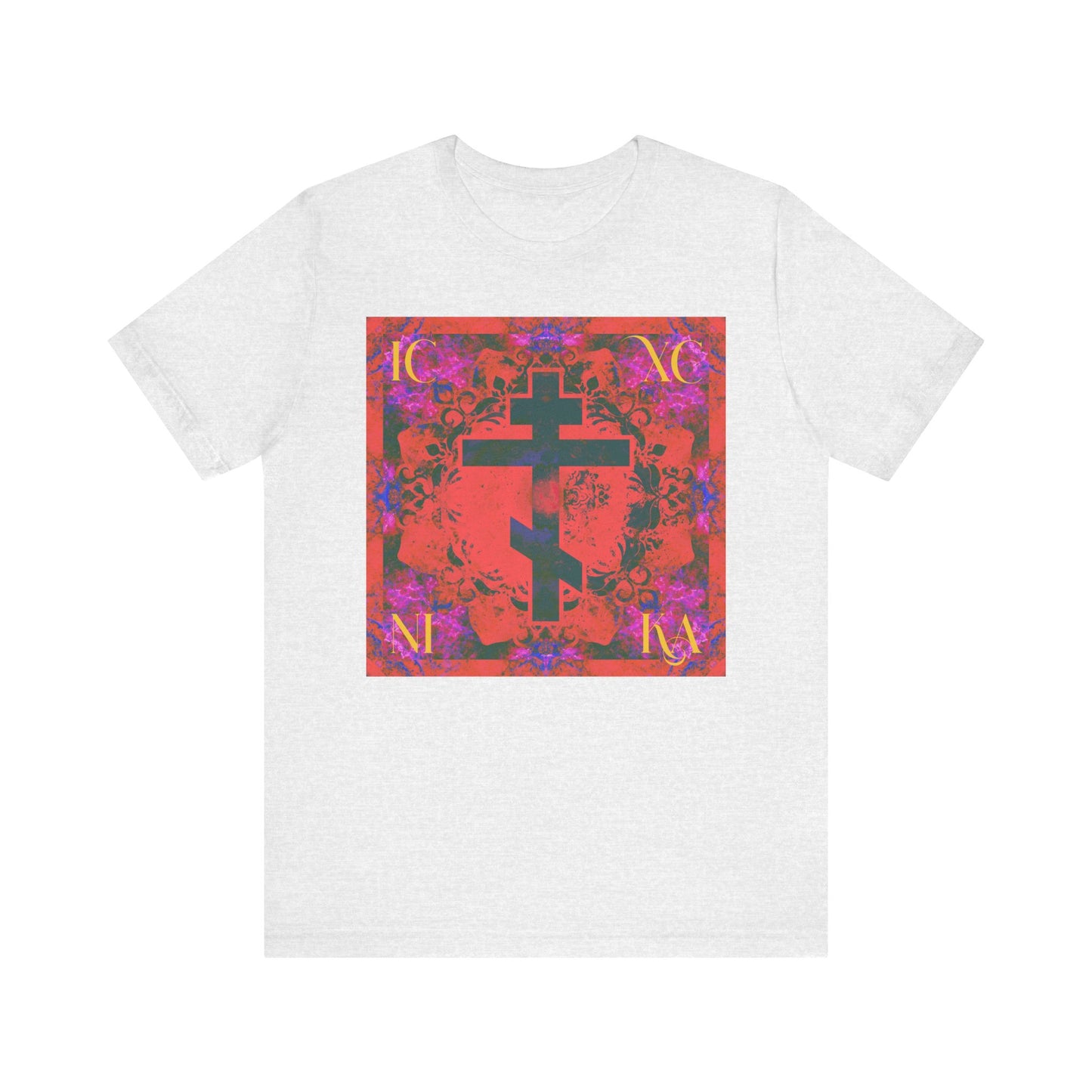 Ash t-shirt featuring a bold, ornate black cross on an orange and magenta floral patterned square—a striking design inspired by St. John of Kronstadt’s devotion, evoking reflection on the Saviour's sufferings. This is the ICXC NIKA Colorful Orange Magenta Cross Orthodox Christian Lightweight Cotton Unisex Tee.