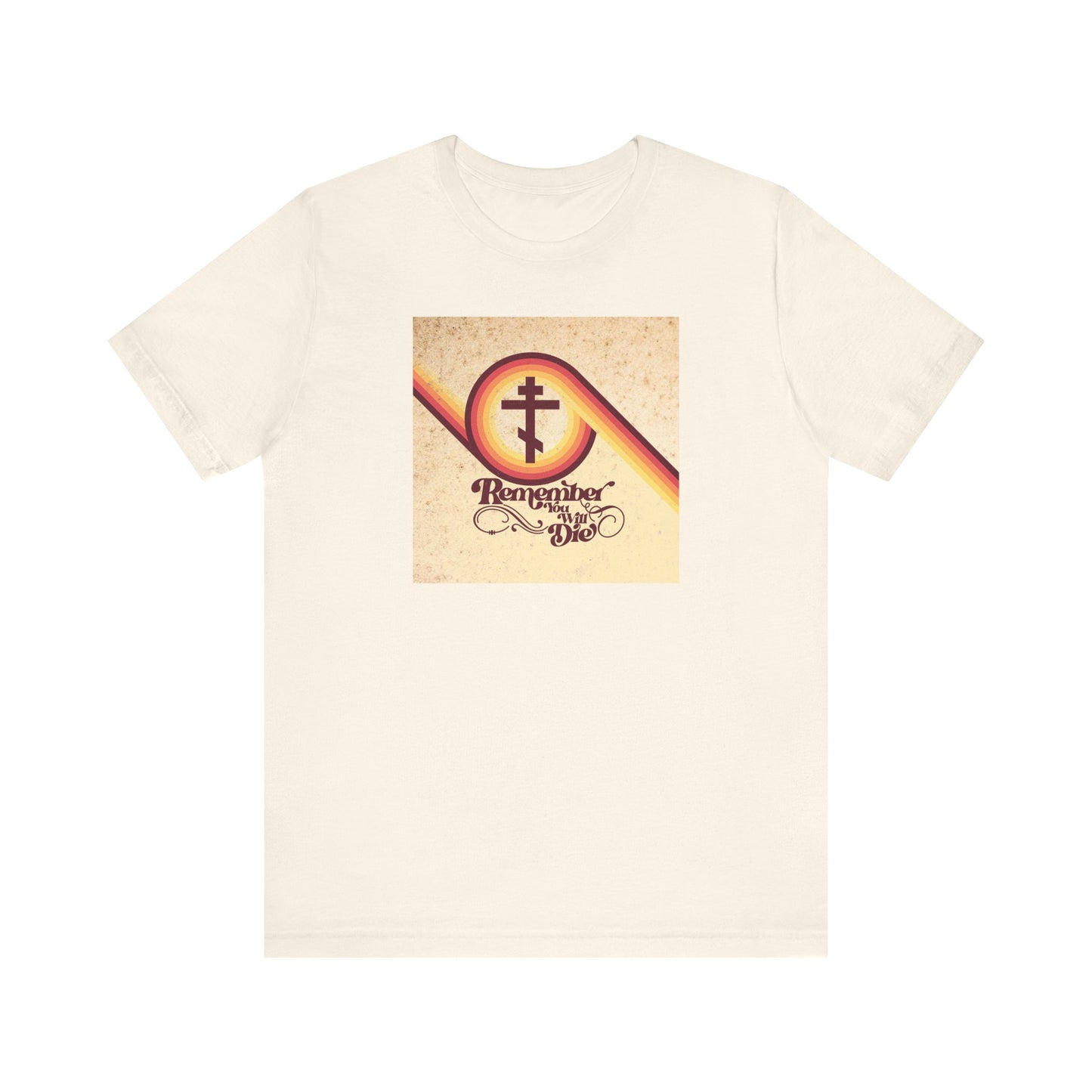 Natural t-shirt featuring a vintage “Remember You Will Die” cross design in 70s aesthetic lettering on the front, inspired by the parable of the rich fool (Luke 12:16-21)—a memento mori reminder of true worth from Orthodox Christian tradition.
