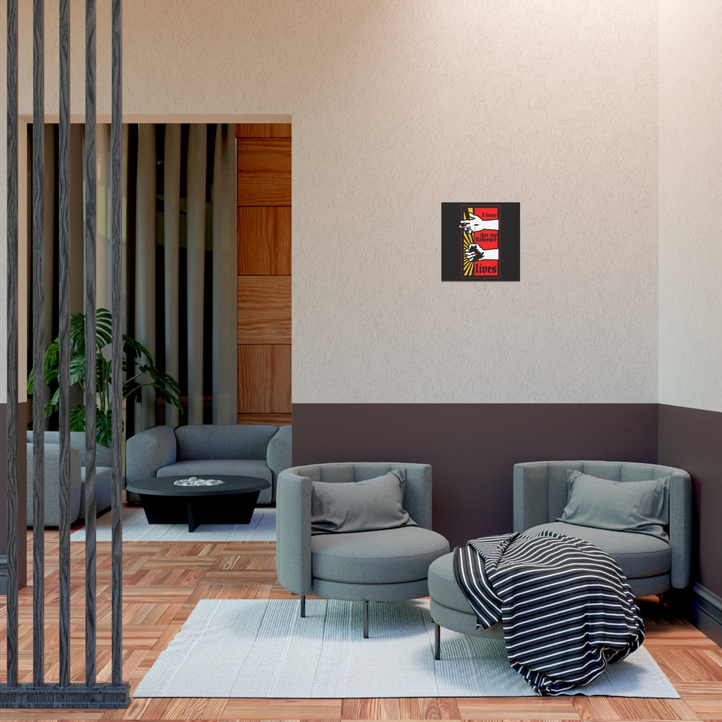 Modern lounge with two gray chairs, round table, and the "I Know That My Redeemer Lives (Job 19:25)" Comic Book Style Orthodox Christian Art Poster featuring resurrected Jesus’s fist with divine power.