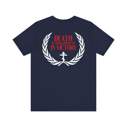 The Archangel Michael of the Apocalypse Iconographic T-shirt features "Death is Swallowed Up In Victory" and a cross in a white laurel wreath on the back. Made from lightweight cotton, this double-sided unisex tee is inspired by his miracle at Colossae.