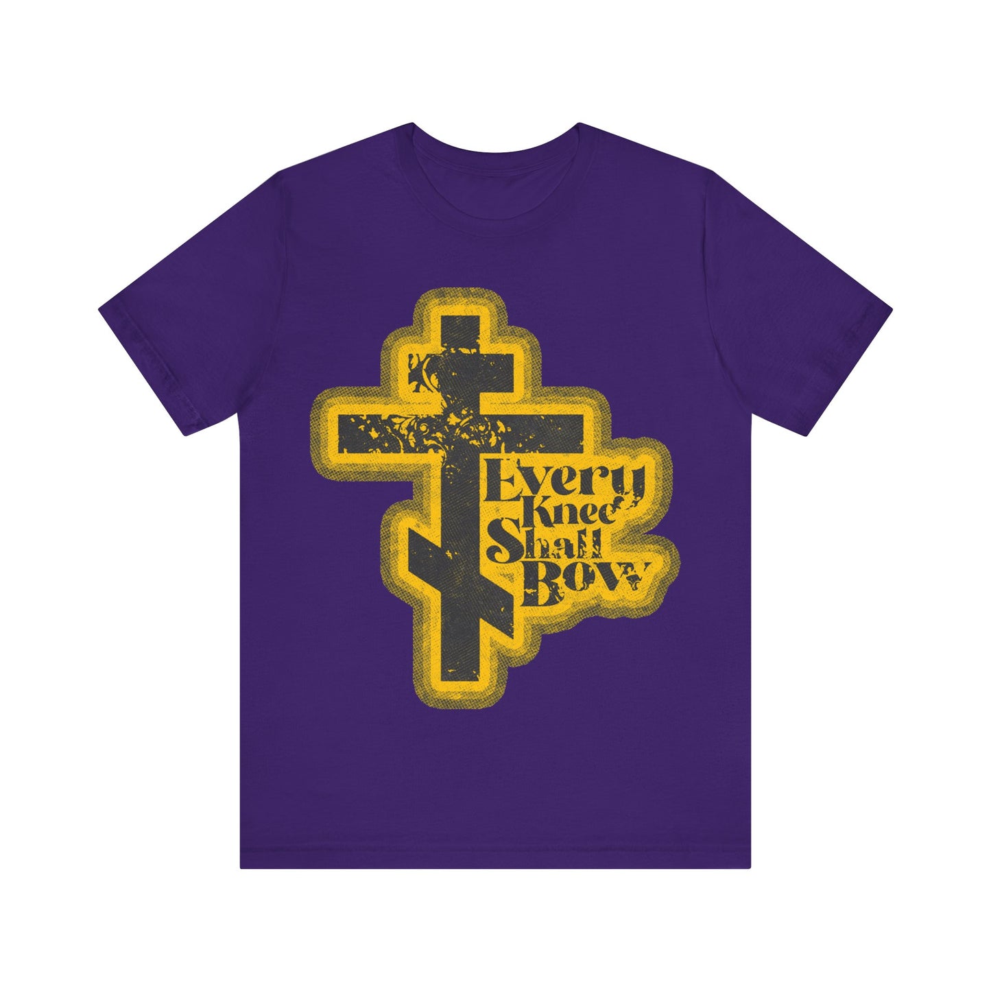 Team Purple "Every Knee Shall Bow" Orthodox Christian T-Shirt features a yellow cross and distressed black and yellow text, inspired by Philippians 2:10–11 & Isaiah 45:23, in a 70s halftone comic book style.