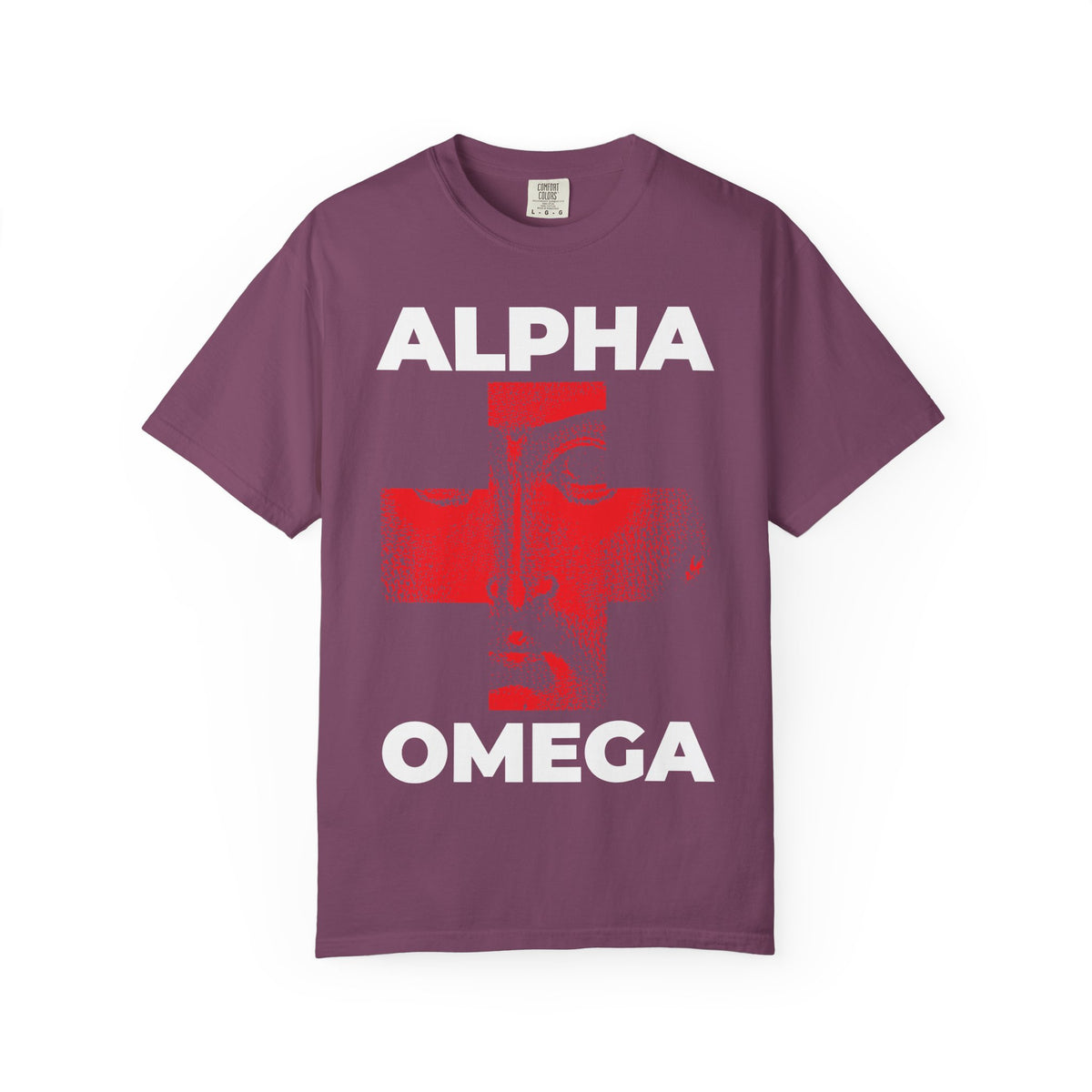 Berry-colored heavyweight cotton unisex tee featuring “I Am The Alpha + The Omega, The Beginning + The End (Rev 1:8)” with ALPHA above, OMEGA below, and Christ’s face depicted in a red cross at the center—an icono-graphic design celebrating the names of God and reminding us that I Am Who I Am.