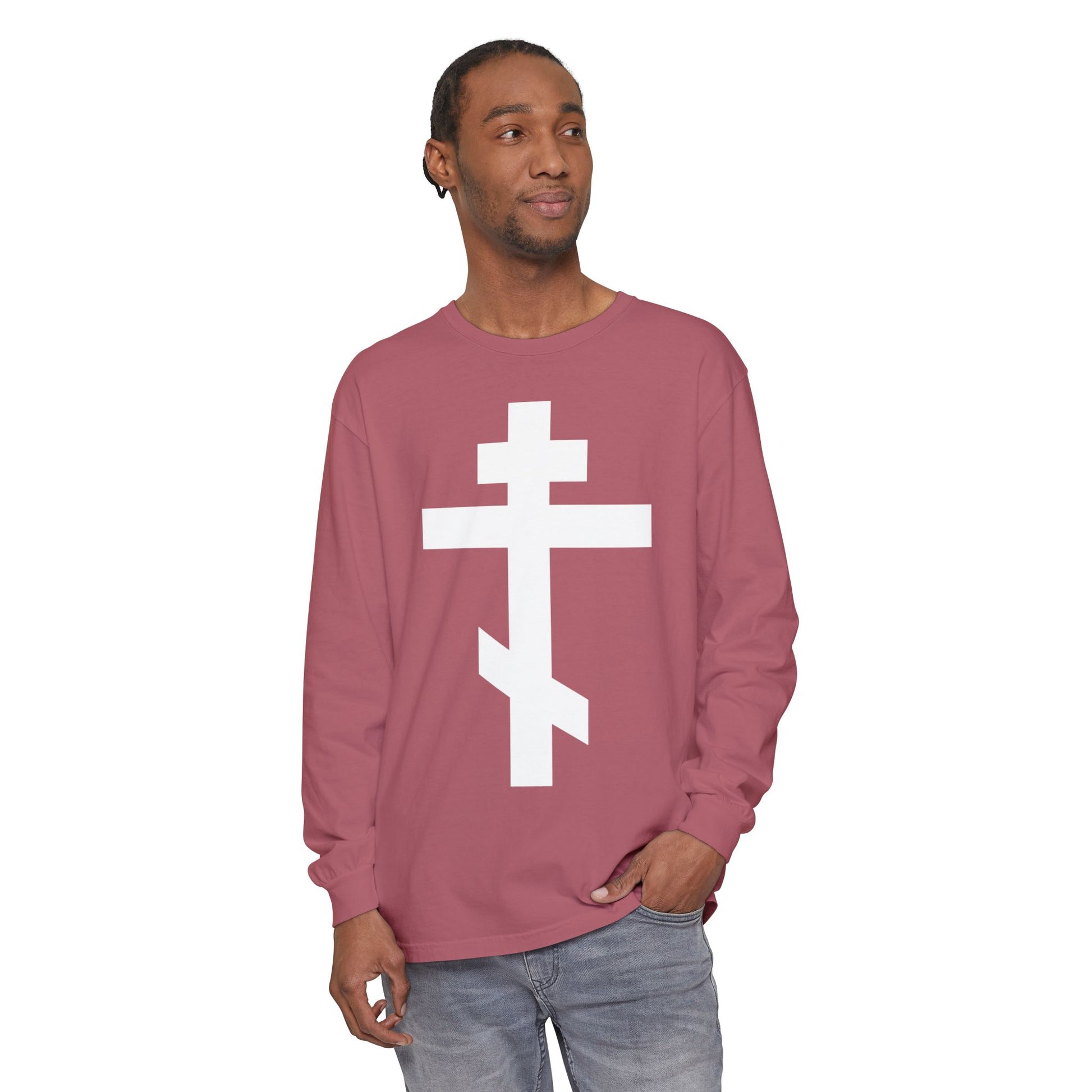 Man in the "White Orthodox Cross" long sleeve shirt featuring Gal 6:14—“May I never boast, except in the cross of our Lord Jesus Christ”—looks to the side, wearing a tribute to faith and salvation.