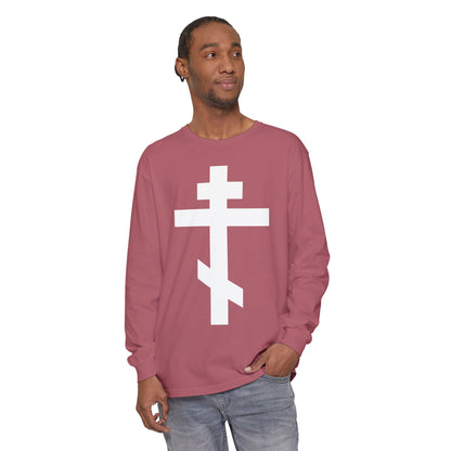 Man in the "White Orthodox Cross" long sleeve shirt featuring Gal 6:14—“May I never boast, except in the cross of our Lord Jesus Christ”—looks to the side, wearing a tribute to faith and salvation.