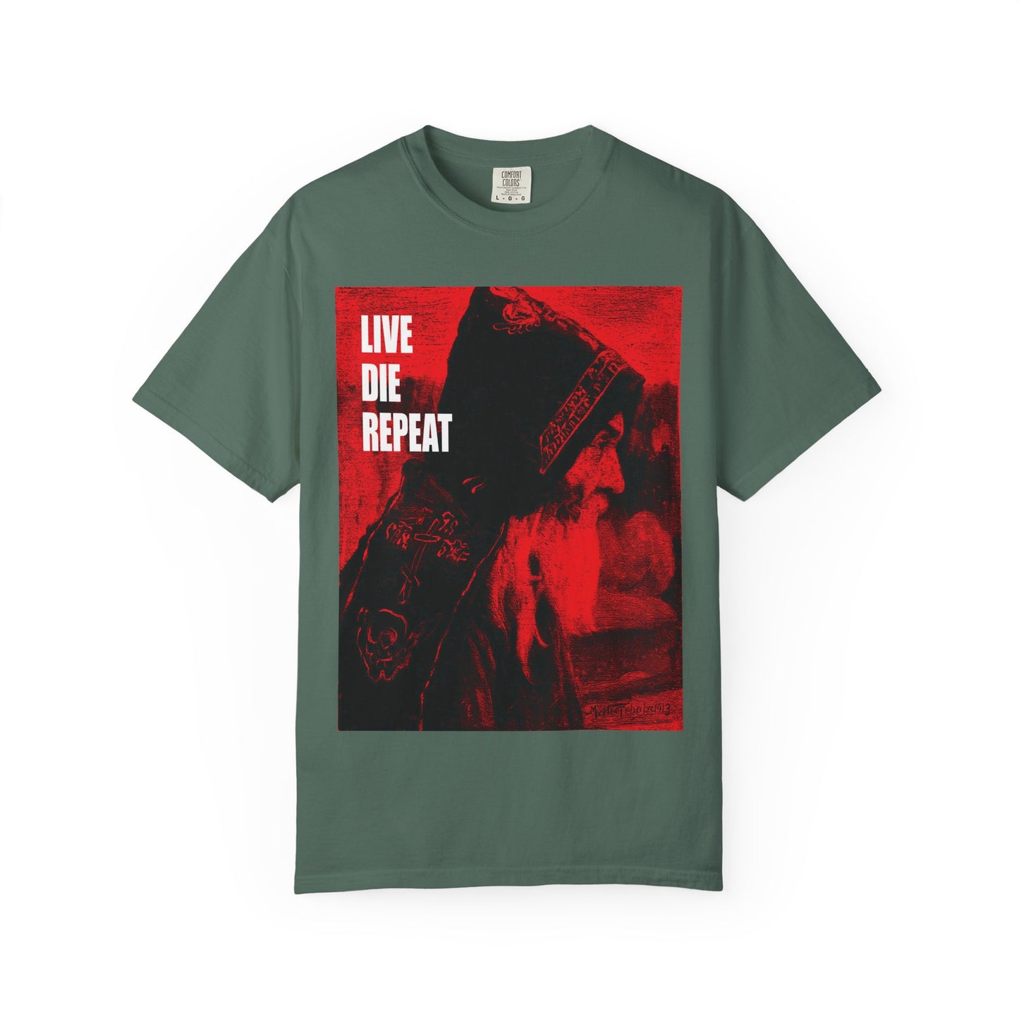 Blue Spruce heavyweight tee featuring Orthodox monk art by Mikhail Nesterov, bold "LIVE DIE REPEAT" text, and the quote: "Die Every Day, You Will Live Forever." Unisex ascetic design.