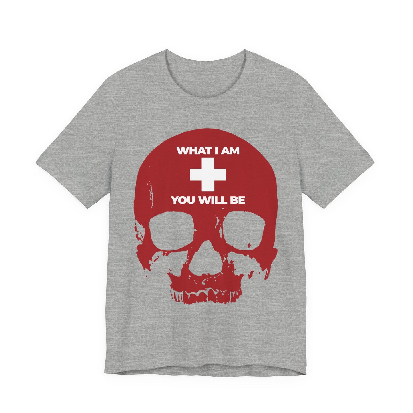 Athletic Heather shirt showcasing a bold red skull graphic with a white cross, bordered by the phrase "WHAT I AM YOU WILL BE" in white text above and below. Drawing inspiration from Ecclesiastes, this Orthodox Christian lightweight cotton unisex tee serves as a memento mori—a timeless reminder once voiced by the Preacher.