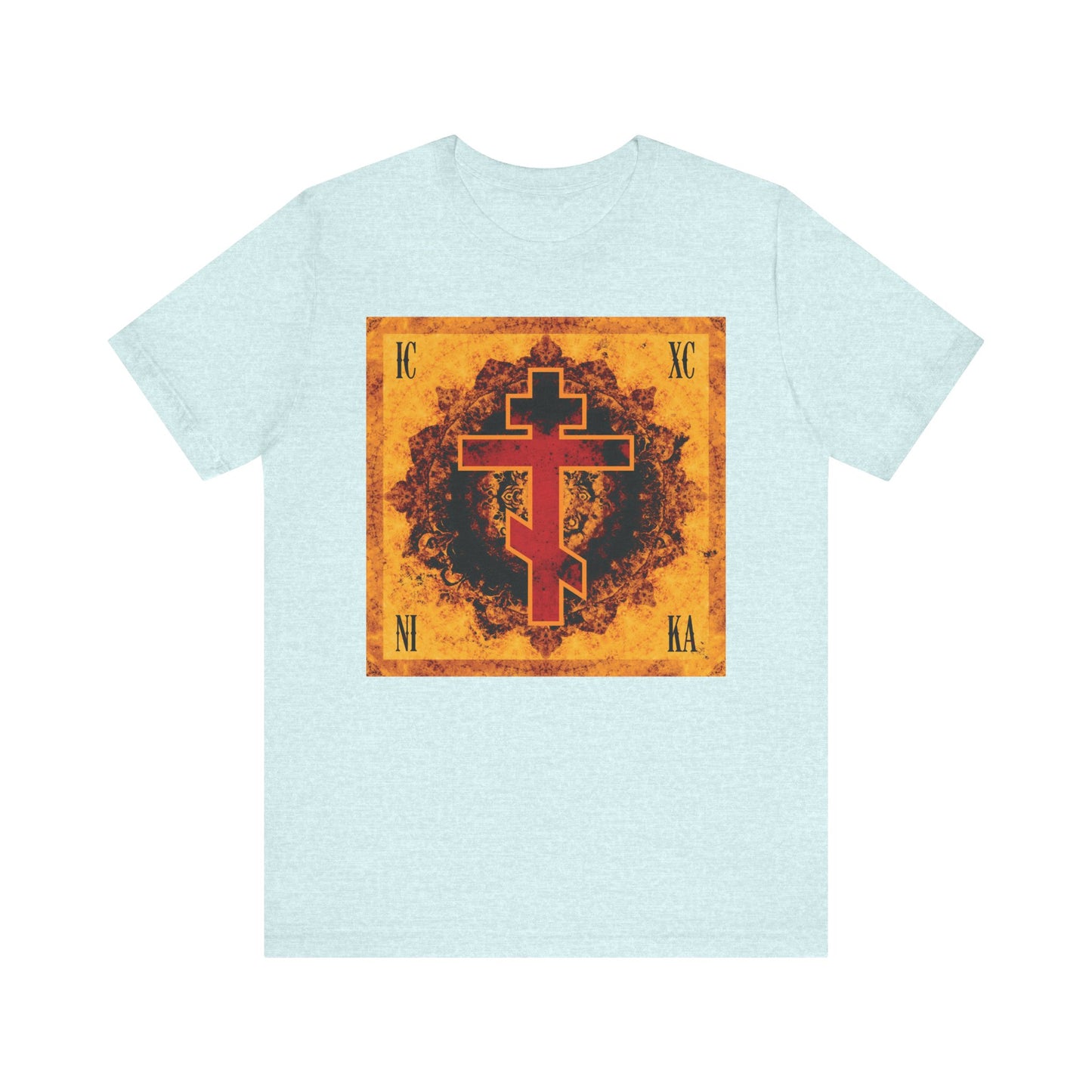 Heather Prism Ice Blue unisex cotton T-shirt featuring a bright orange distressed square with an ornate red Orthodox ICXC NIKA cross—symbolizing the Elevation of the Precious Cross—and Greek letters in each corner.
