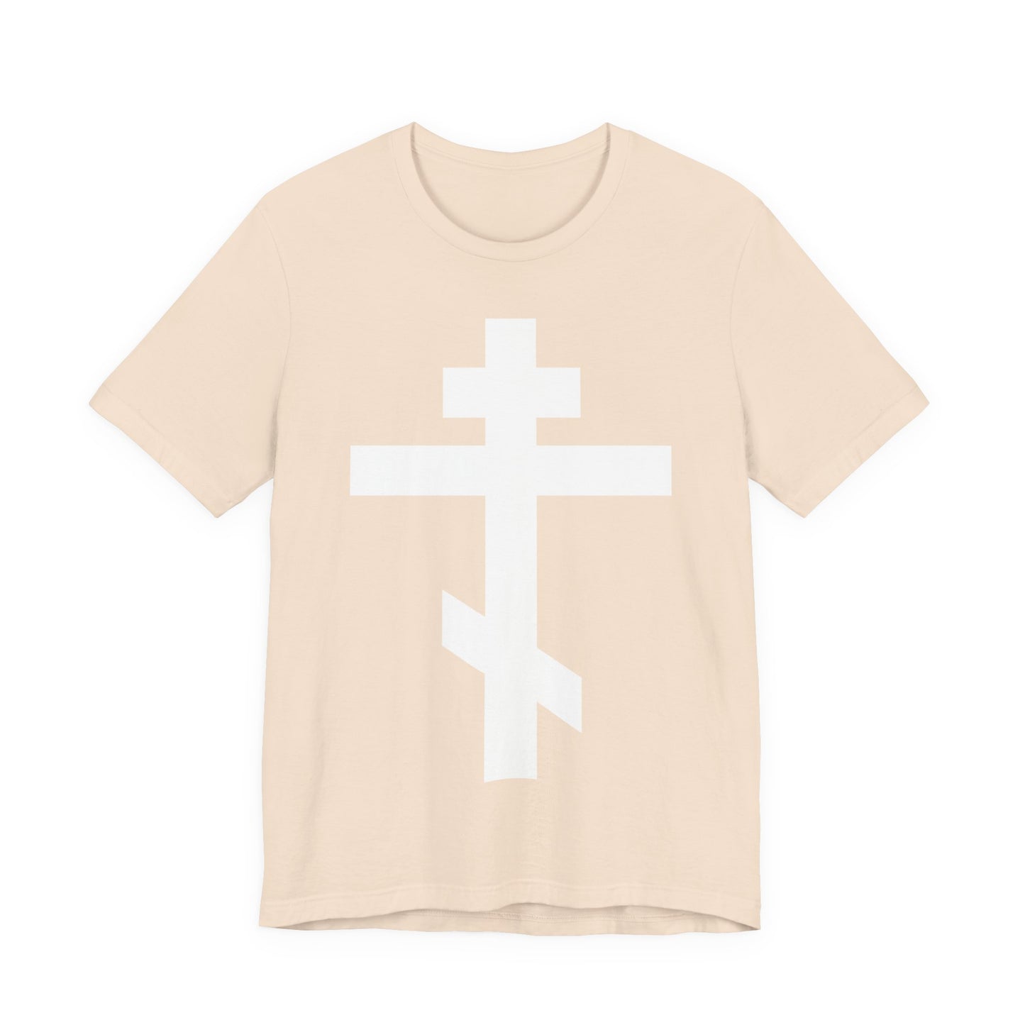 Soft cream unisex tee featuring a large white Orthodox cross and the quote "May I never boast, except in the cross of our Lord Jesus Christ" (Gal 6:14), symbolizing salvation and the Saviour’s sufferings.