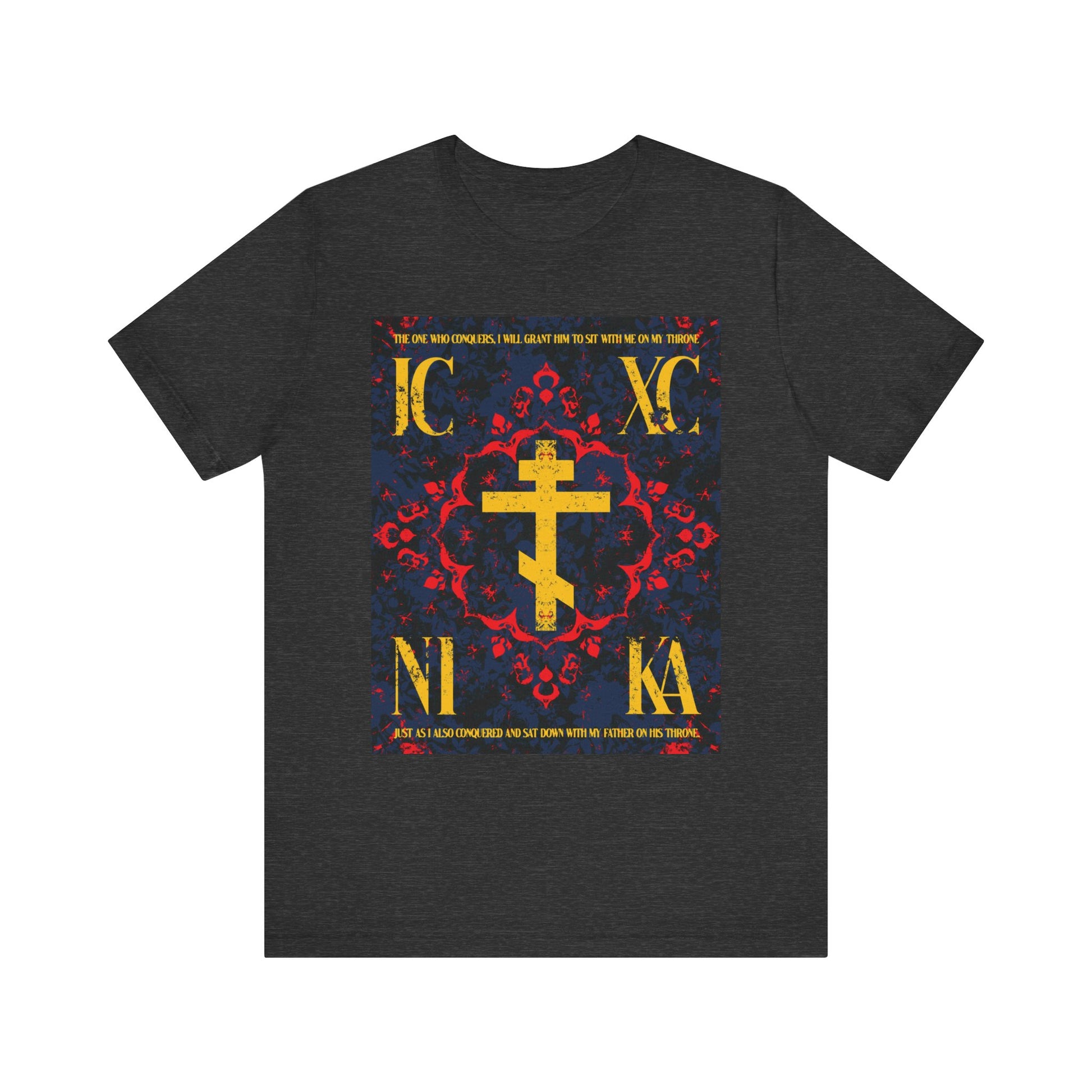 Dark Grey Heather unisex t-shirt featuring the IC XC NIKA Orthodox Cross with a medieval floral design and "The One Who Conquers" (Revelation 3:21), made from lightweight cotton.