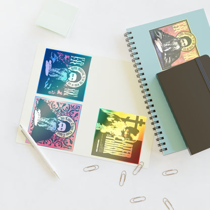 Open notebooks, a pen, sticky notes, paper clips, and the Fr Seraphim Rose Four Sticker Sheet No. 1 on a white desk.