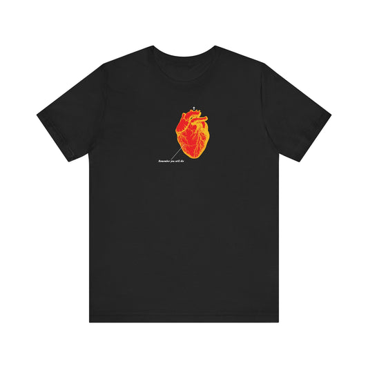 Black "Remember You Will Die" t-shirt featuring an inverted red & orange retro medical heart design and "Memento Mori" text, inspired by Orthodox Christian themes. 100% cotton.