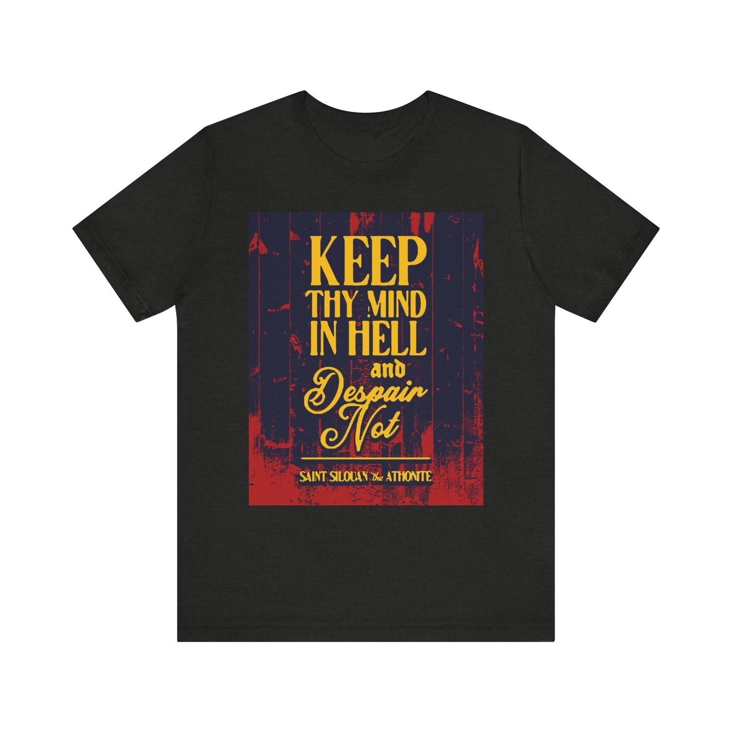 Black Heather unisex tee with yellow and red text: "Keep thy mind in hell and despair not." Inspired by St. Silouan the Athonite, this lightweight Orthodox Christian cotton shirt is a reminder for spiritual warfare and humility.