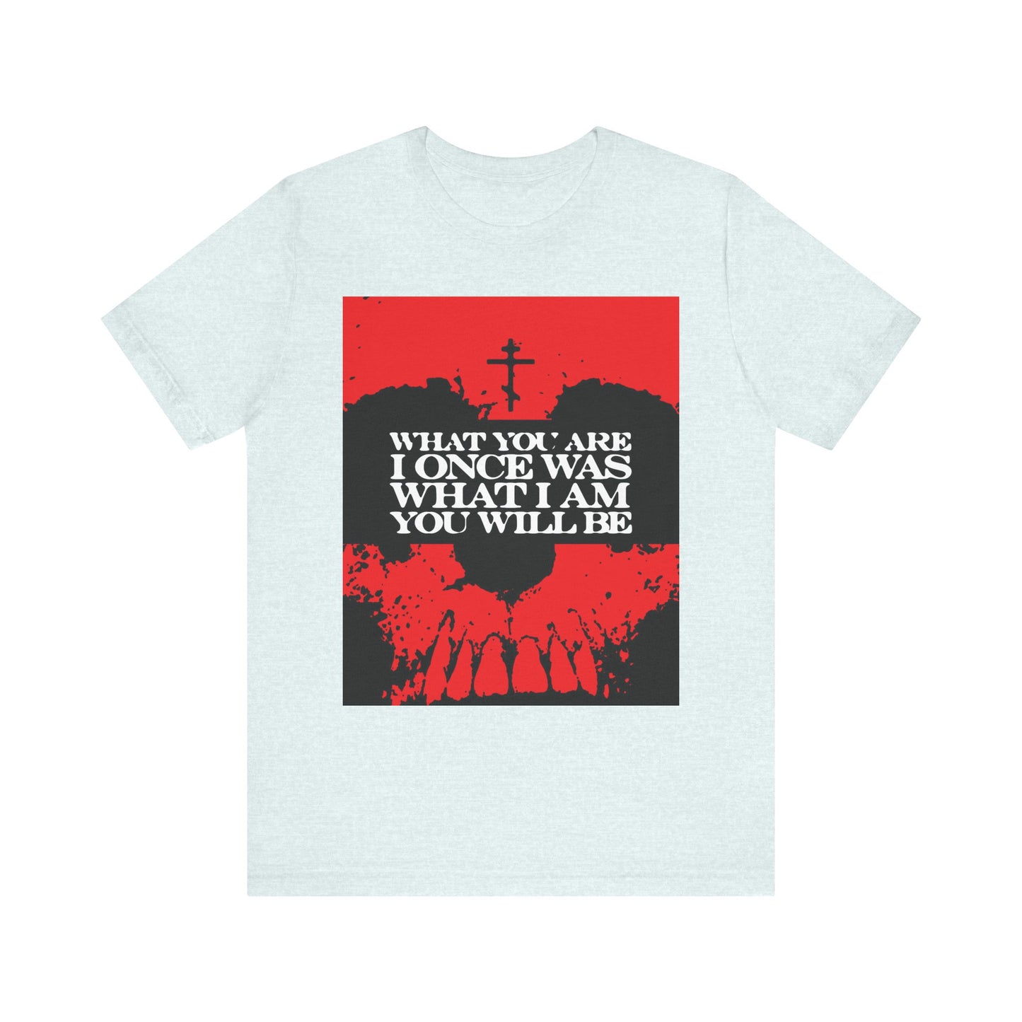 Heather Ice Blue tee featuring a bold red and black skull graphic, cross, and striking white text: "What you are I once was..."—a Memento Mori design inspired by Christian salvation and the contemplation of mortality.