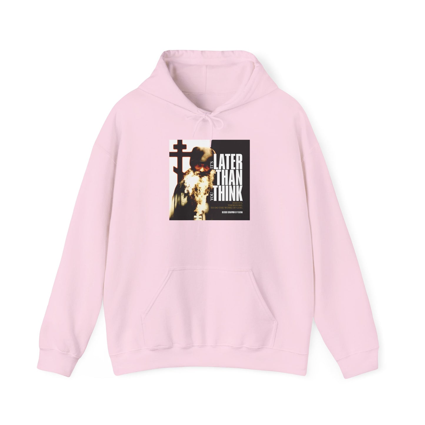 Light pink "It's Later Than You Think" hoodie featuring a photo of Fr Seraphim Rose with modern cinematic poster typography, inspired by Orthodox Christian themes—a style that reminds you every moment shapes your way of life.