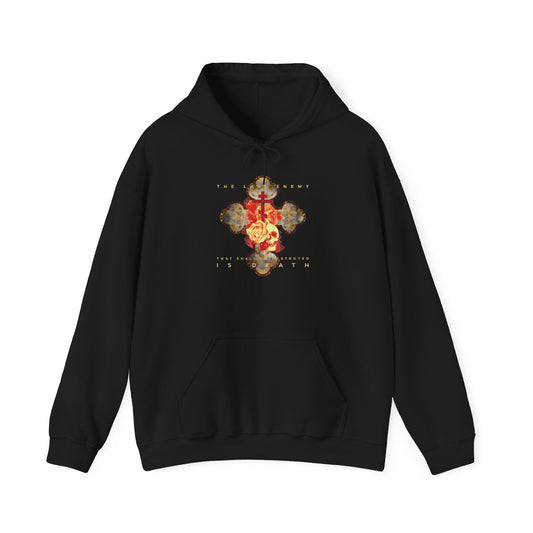 Black “The Final Enemy That Shall Be Destroyed Is Death (1 Cor 15:26)” hoodie featuring a metallic gothic cross with rose and skull design, inspired by the hope of Christ’s resurrection and the Orthodox Christian message of victory over death.