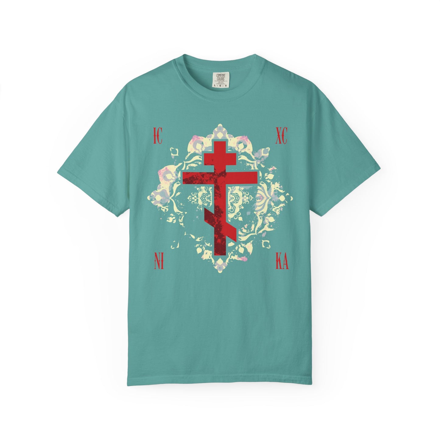 Seafoam heavyweight cotton tee featuring a textured red Orthodox cross with medieval floral background and Greek letters ICXC NIKA—symbolic of Jesus Christ’s victory, inspired by St John of Kronstadt. Unisex fit.