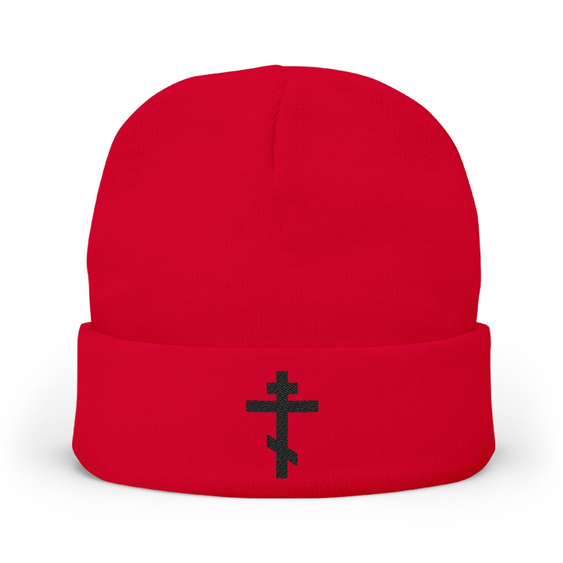 Red beanie featuring a black Orthodox TriBar Cross and the phrase "Nail My Passions to the Wood of Thy Precious Cross O Lord" embroidered on the folded brim, displayed on a white background.