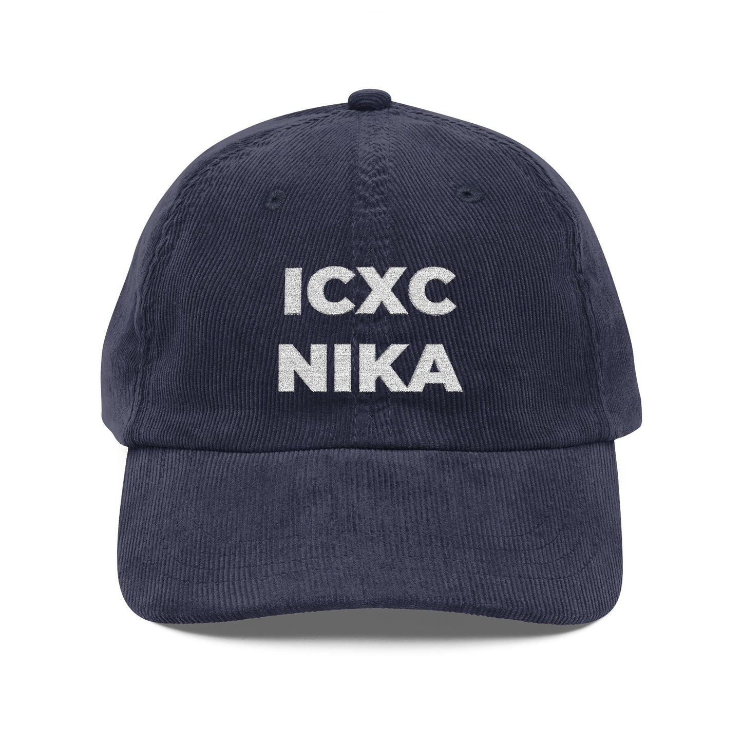 Navy blue embroidered cotton corduroy cap featuring white ICXC NIKA text, the Orthodox Christogram meaning "Jesus Christ Conquers.