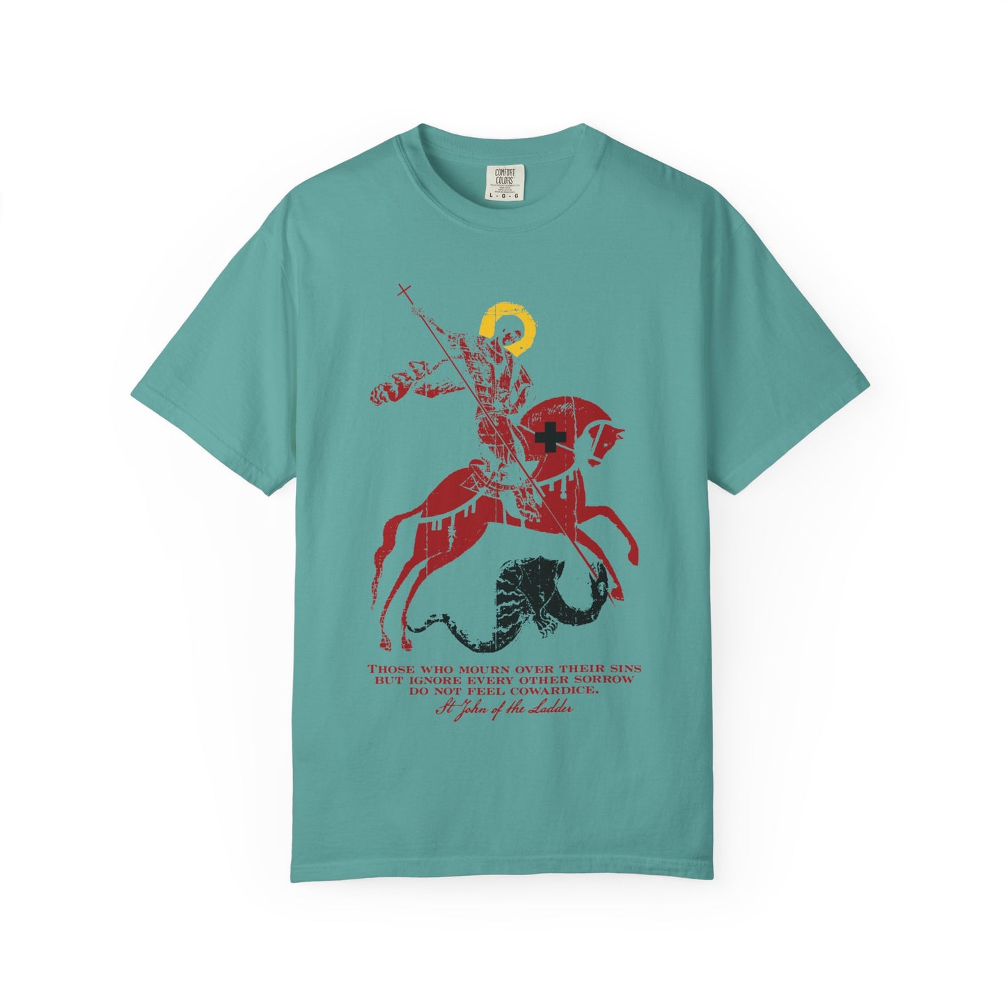 Seafoam heavyweight cotton unisex tee featuring an IconoGraphic of St George slaying the dragon, accented with red and yellow details and text inspired by St John Climacus on mourning over one’s sins—a thoughtful Orthodox Christian tribute to godly sorrow.