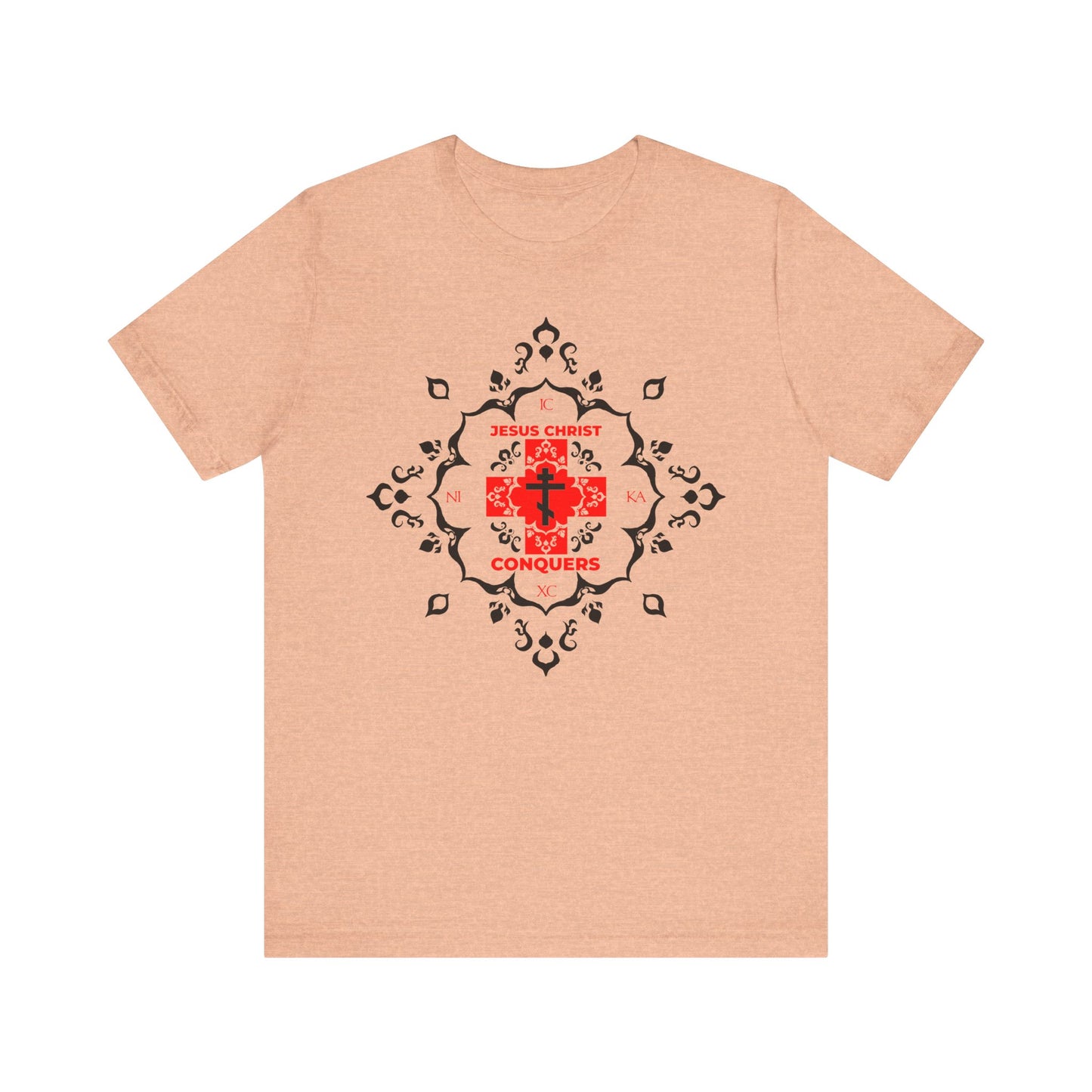 Heather peach lightweight unisex tee featuring a white Orthodox cross with "Jesus Christ Conquers" in modern red font and surrounded by a medieval filigree design, symbolizing victory over sin as inspired by St. John Chrysostom’s teachings.