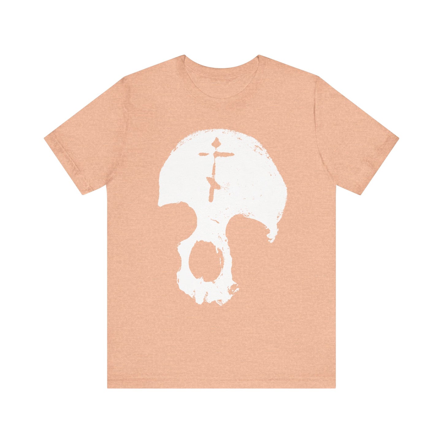 Heather peach t-shirt featuring a large, white distressed skull and Orthodox cross design at the center—this striking "Skull With Orthodox Cross | Gothic Christian | All is Vanity | Remember You Will Die | Memento Mori" tee offers a subtle tribute to the wisdom of St Ignatius Brianchaninov, reminding us of the fleeting nature of human glory and vainglory.