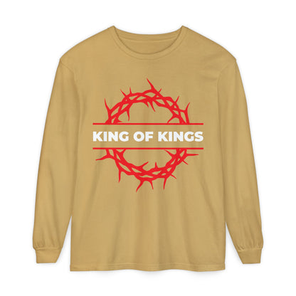 Mustard cotton long sleeve shirt with a red crown of thorns and “KING OF KINGS” in white on the front. Inspired by Revelation 19:16, declaring Christ is King of Kings and The King of Glory.