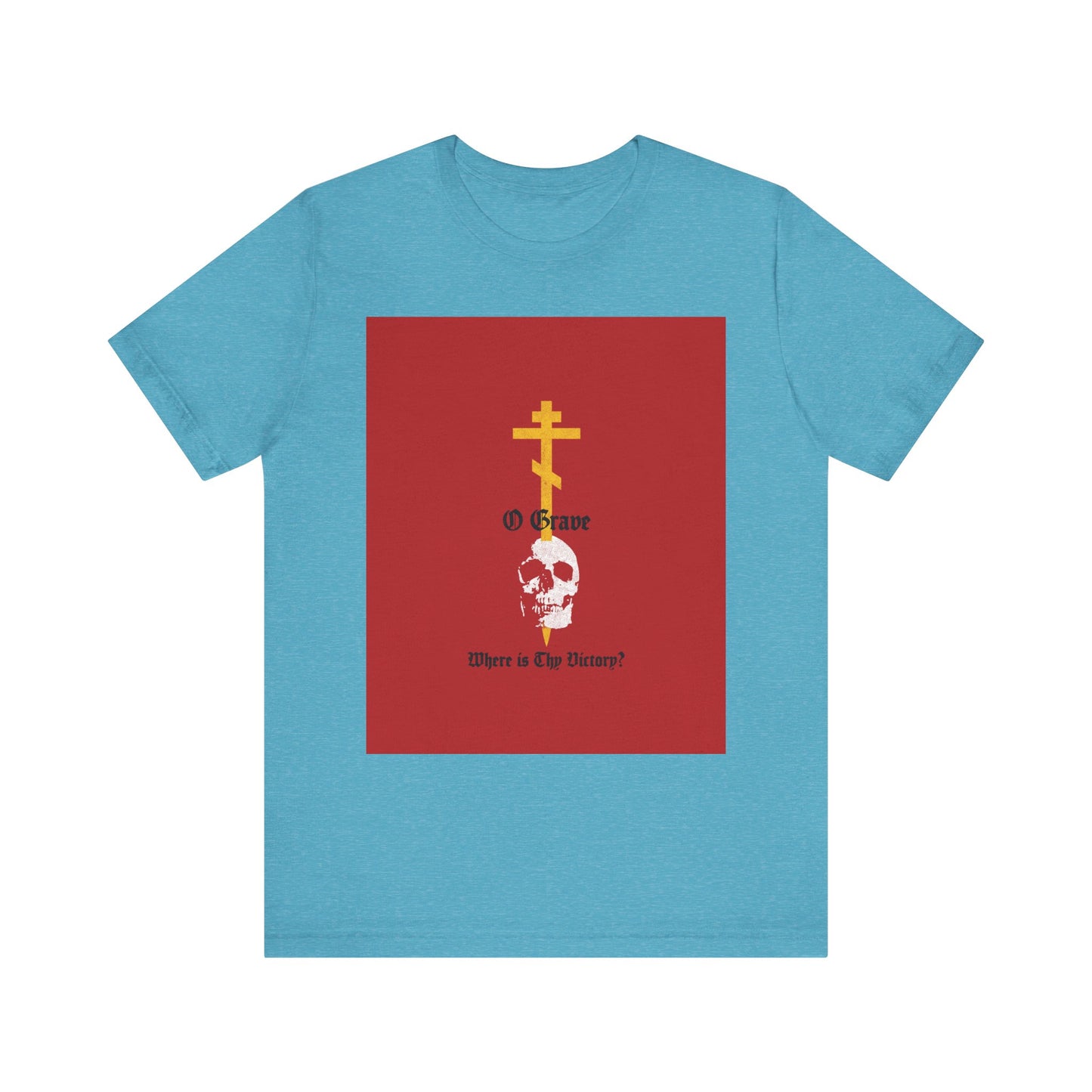 Heather Aqua unisex tee featuring a gold Orthodox cross piercing a white skull with bold red and yellow accents, and the text: O Grave Where is thy Victory?—a striking Christian design inspired by 1 Corinthians 15:55, symbolizing hope in resurrection and the promise of immortality.
