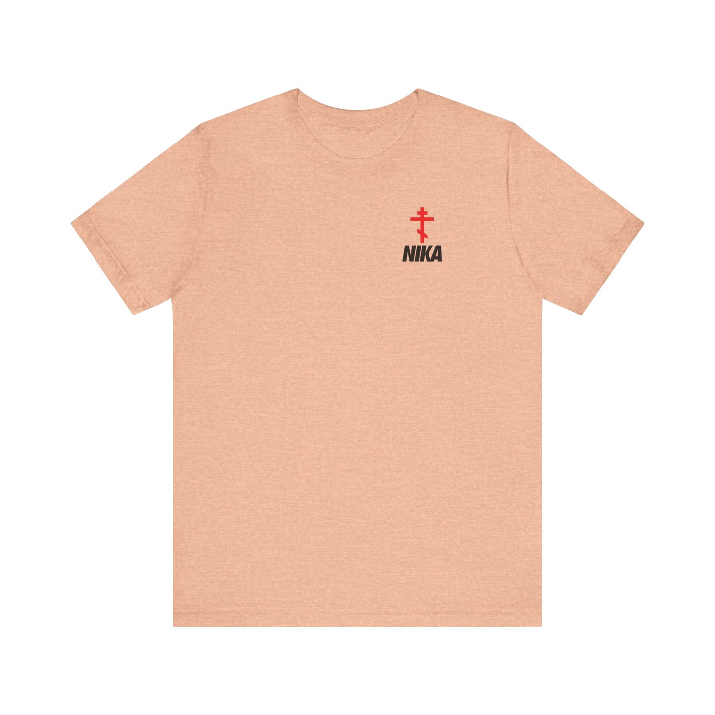 Heather peach unisex tee featuring a small Eastern Orthodox cross, bold NIKA text, and a NIKE logo mashup—an athletic ascetic Christian design printed on the left chest in lightweight cotton.