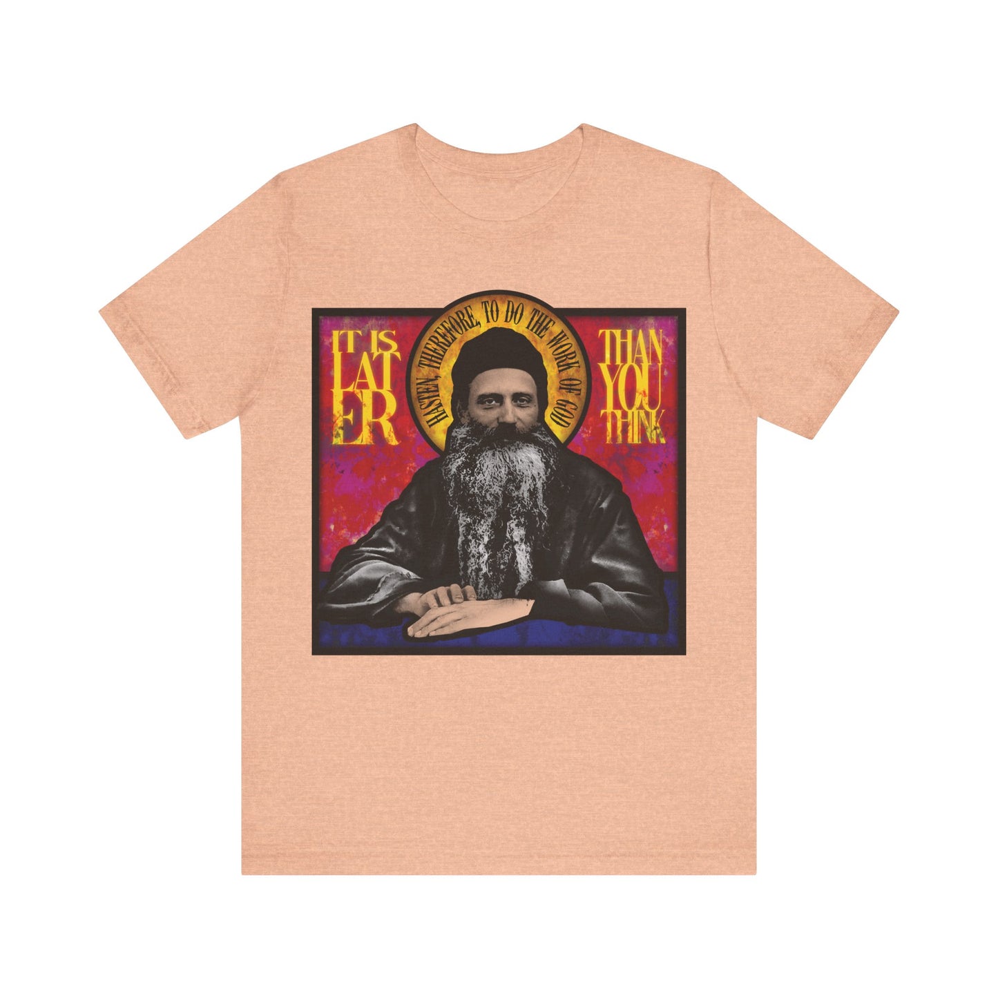Heather peach “It Is Later Than You Think” cotton t-shirt featuring Fr. Seraphim Rose, American Orthodox saint, in a stained glass style—a subtle nod to salvation and the Kingdom of Heaven.