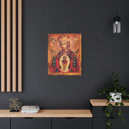 The “Mother of God of Nicaea Russian Orthodox Christian Icon | Panagia | Theotokos Mary | Religious Canvas Sacred Wall Art” hangs on a dark wall above a modern cabinet adorned with plants and books.