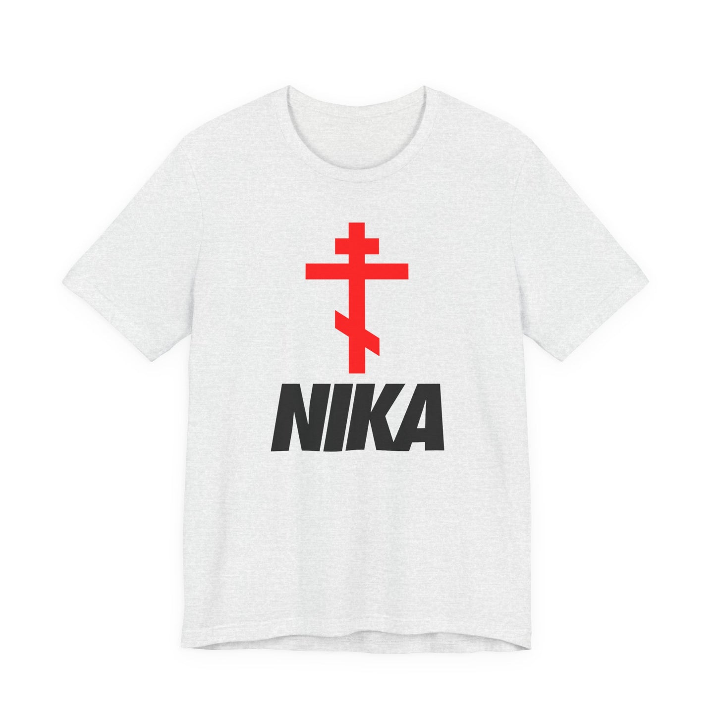 An ash T-shirt features a red Orthodox cross above bold black NIKA text, blending classic iconography with minimalist design in this athletic Christian tee inspired by the iconic NIKE logo.