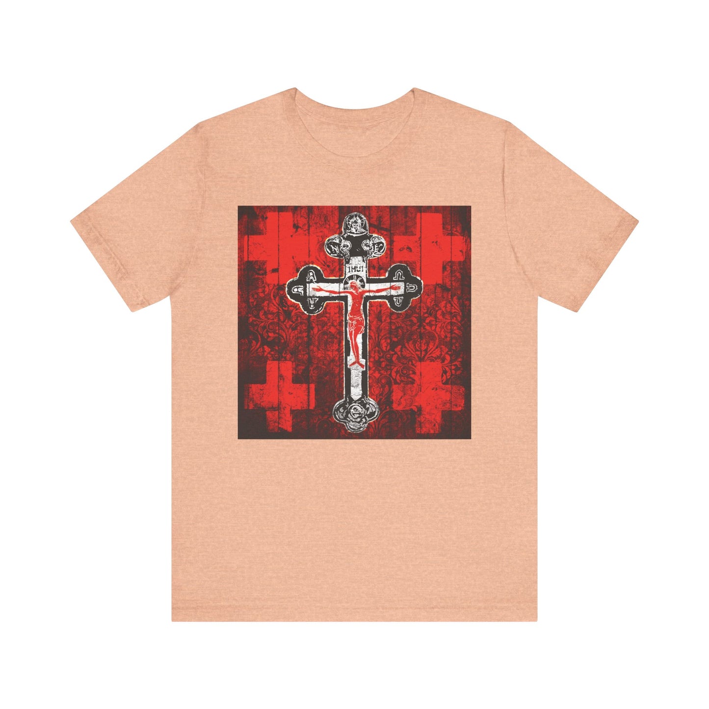 Heather peach unisex tee featuring an Alpha & Omega Orthodox Crucifix graphic in red, white, and black. Lightweight cotton with a striking Christian icon design.