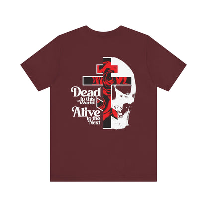 Maroon "Dead to This World" unisex tee with a white cross on the front left chest, and red rose, skull, and text—goth aesthetic design—on the back. Lightweight cotton.