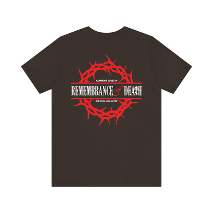 Black unisex cotton tee with a red cross on the front left breast and a crown of thorns on the back, featuring "REMEMBRANCE OF DEATH" and "ALWAYS LIVE IN." Orthodox design.