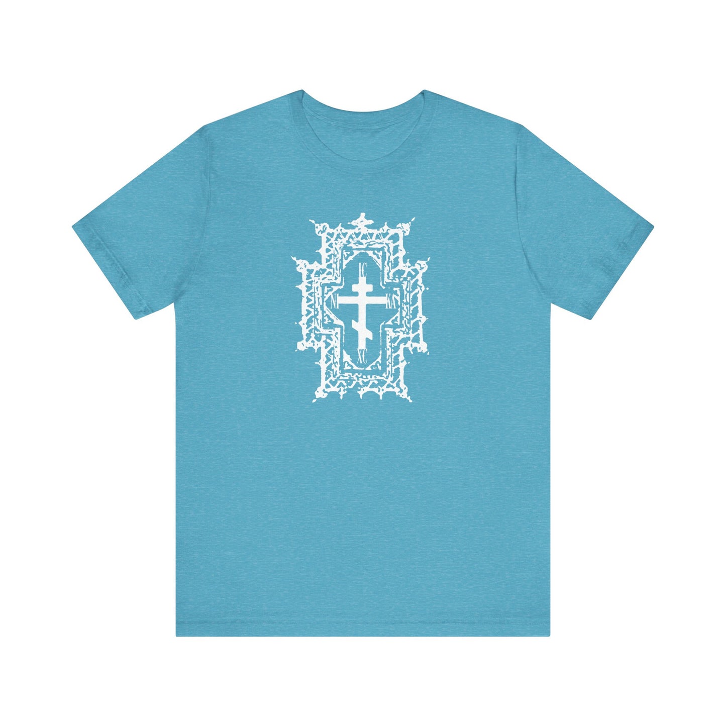 Heather Aqua tee featuring a Gothic Cathedral style Orthodox cross with "ICXC NIKA" and "Healed By His Wounds," symbolizing Jesus Christ conquering through suffering. Lightweight cotton, unisex fit.
