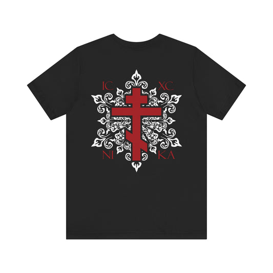 Black lightweight cotton unisex T-shirt featuring a red Orthodox ICXC NIKA cross on the front left chest, intricate white medieval floral designs, and Greek letters with a bold red cross on the back—available as a custom order for a personalized touch.