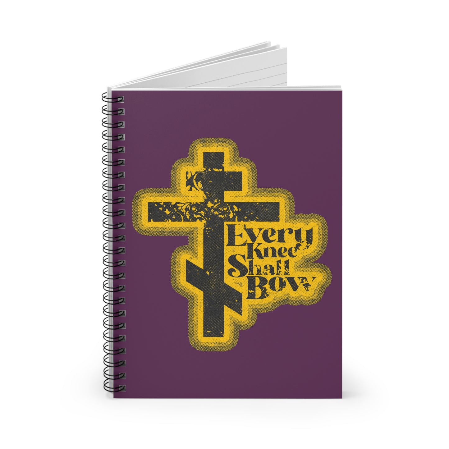 A spiral notebook featuring a 70s distressed halftone comic book design, "Every Knee Shall Bow," inspired by Philippians 2:10-11 and Isaiah 45:23. Orthodox Christian themed.