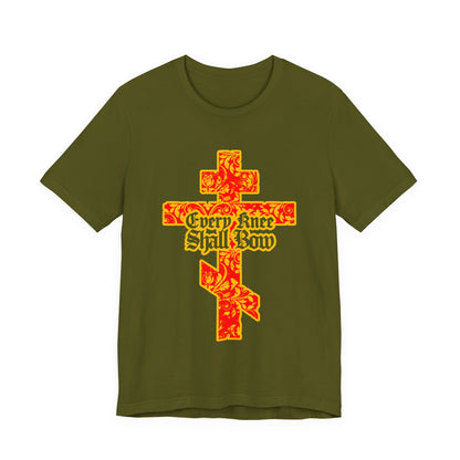 Olive green unisex tee featuring a gold and red floral Orthodox cross with gothic "Every Knee Shall Bow" text, inspired by Isaiah 45:22-24 and Philippians 2:7-11.