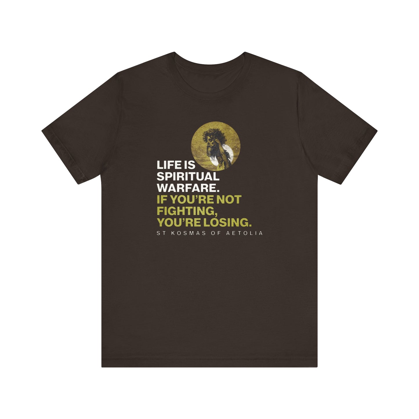 Brown unisex tee featuring "Life is Spiritual Warfare" with St Kosmas of Aetolia, inspired by Gustave Dore’s David & Goliath. Lightweight Orthodox cotton shirt—a daily reminder of the unseen spiritual battle.